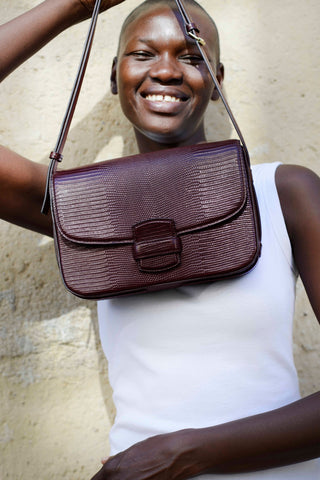 <tc>The Crossbody · Embossed Lizard Leather · Cherry · Limited Edition</tc>