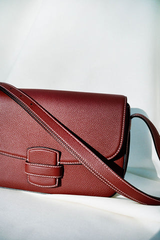 <tc>The Crossbody · Grained Leather · Griotte · Limited Edition</tc>